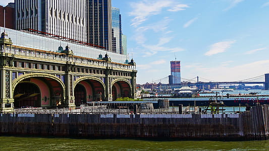 Governors Island Ferry Terminal viewed from a Staten Island bound Staten Island Ferry from the Lower Manhattan Ferry Terminal. The State Island Ferry makes the 5 mile crossing in about 25 minutes offering one of the best views of Lower Manhattan, Statue of Liberty and Ellis Island ... and it s all free. thumbnail