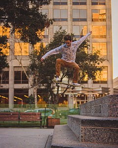 man riding on skateboard thumbnail