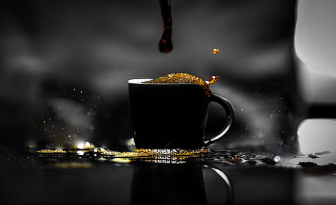 Macro Photography of Spilled Coffee-filled Teacup thumbnail