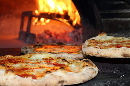 baked pizza in wood fired oven thumbnail
