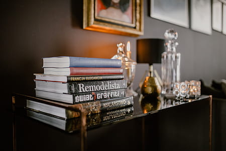 Decanter, candles, and a painting on the wall thumbnail