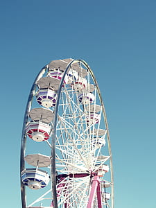white ferris wheel under blue sky at daytime thumbnail