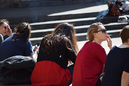 group of people sitting in park thumbnail