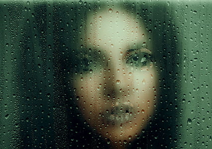 photo of woman in frosted glass thumbnail