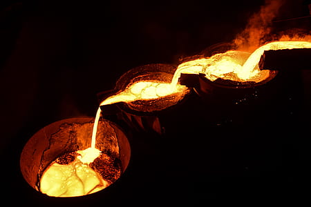 melted metal pouring on container thumbnail