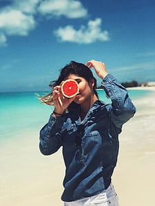 Woman Holding Grapefruit thumbnail