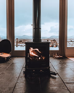 firewood burner burning inside the building thumbnail