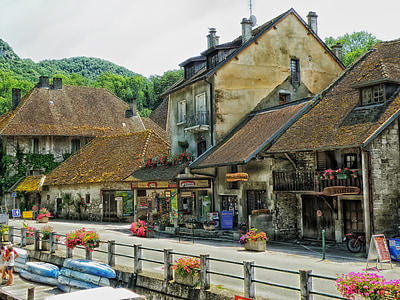 brown roof painted houses under white sky at daytime thumbnail