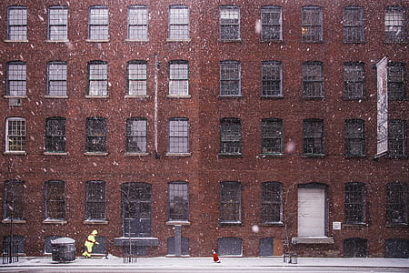 brown building facade near road thumbnail