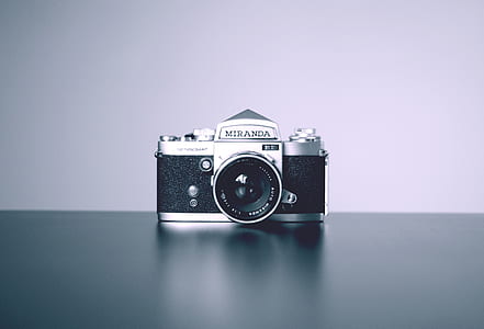 black Miranda SLR camera on black surface thumbnail