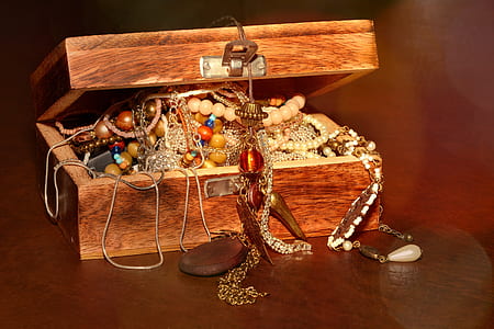 brown wooden box with necklaces and bracelets inside thumbnail