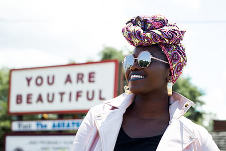 woman near you are beautiful signage outdoor thumbnail