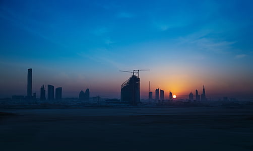 unfinished gray concrete building during golden hour thumbnail
