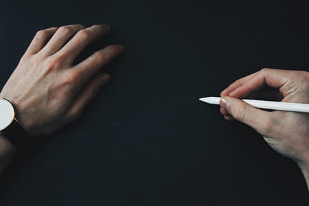 man holding Apple Pencil thumbnail