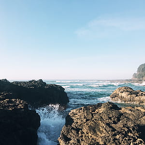 shore waves during daytime thumbnail