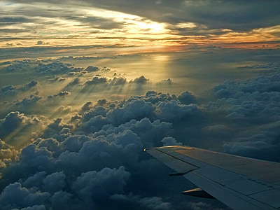 white plane flying at daytime thumbnail