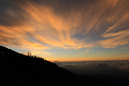 silhouette of mountain during golden hour thumbnail