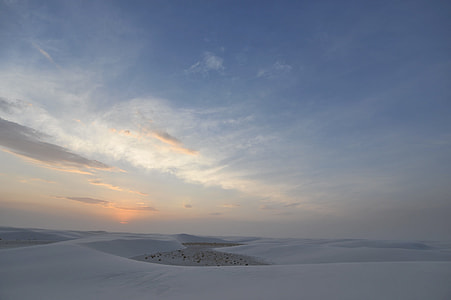 field of snow photo in golden hour thumbnail
