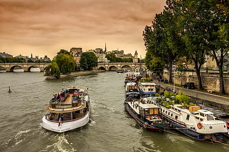 white and brown ship on body of water thumbnail