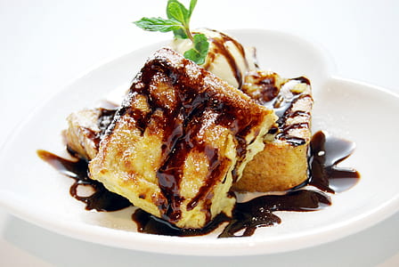 dessert topped with chocolate syrup thumbnail