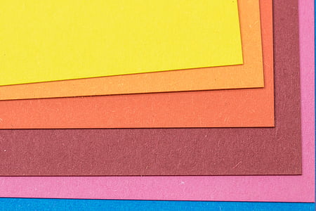 person taking photo of assorted-color empty papers thumbnail