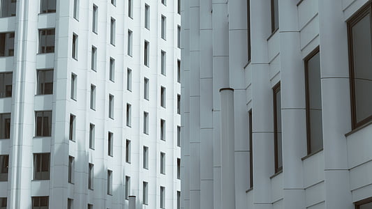 photography of white buildings during daytime thumbnail