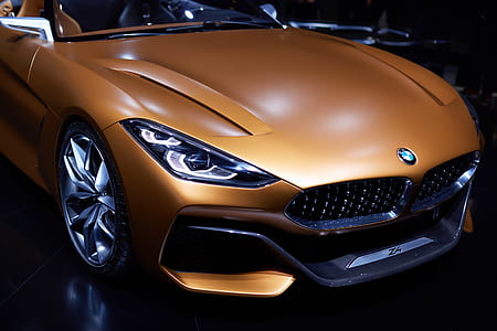 gold BMW sports car thumbnail