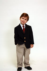 photo of boy wearing black suit jacket and gray dress pants thumbnail