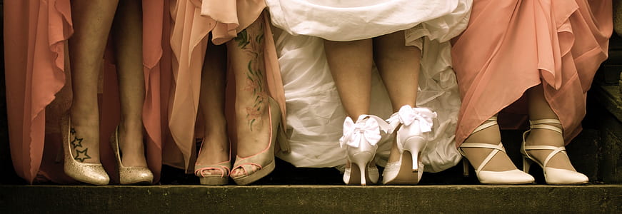 group of people wearing several heels thumbnail