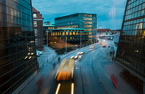 timelapse photography of vehicles on road thumbnail