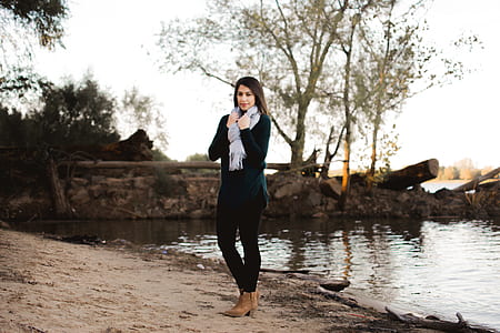 Photo of Woman Standing on the Shore thumbnail