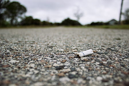 cigarette butt on concrete floor thumbnail