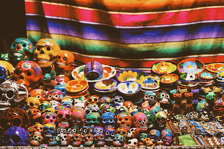 photo of assorted-color calavera figurines thumbnail