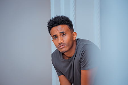 man looking at the camera thumbnail