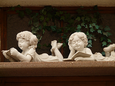 two girl and boy reading books statuette thumbnail