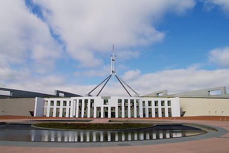 white concrete building during daytime thumbnail