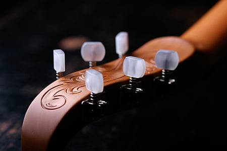 brown guitar head stock thumbnail