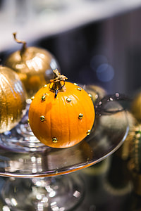 Golden ornamental pumpkins with cactuses thumbnail