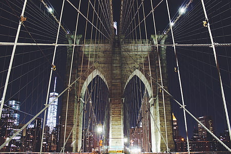gray concrete bridge during nighttime thumbnail