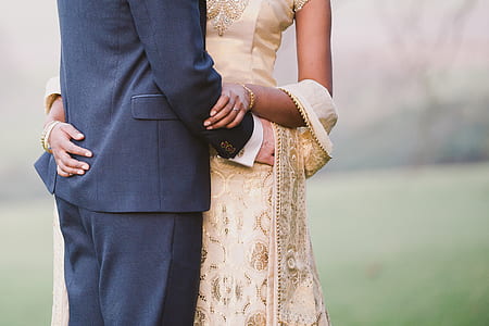 man and woman standing in front of each other thumbnail