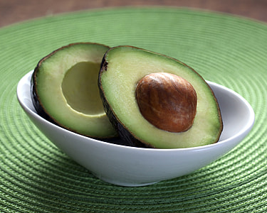 photo of sliced avocado fruits in white ceramic bowl thumbnail