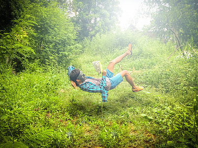 man doing stunt on green grass field thumbnail