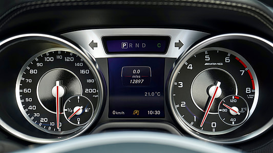 black and silver automotive gauge cluster with digital interface thumbnail
