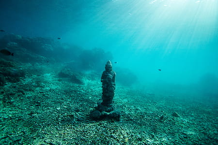 statue on seabed under water thumbnail