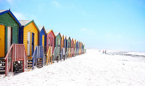 photo of assorted houses on snow during daytime thumbnail