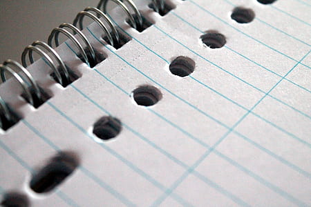 close up photography of spiral note thumbnail