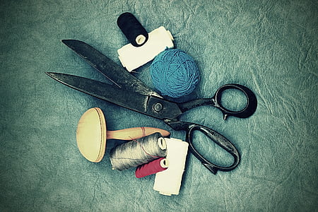 black scissors and threads thumbnail