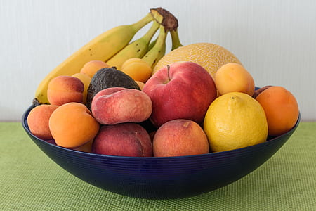 variety of fruits on ceramic bowl thumbnail