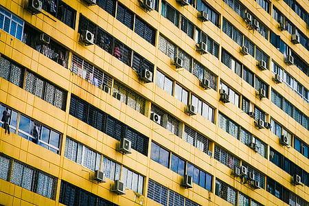 brown building with glass walls thumbnail