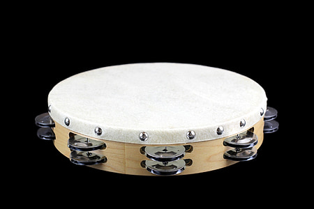 white and brown tamborine thumbnail